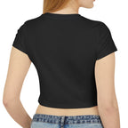 Person wearing a black crop top and blue jeans on a white background