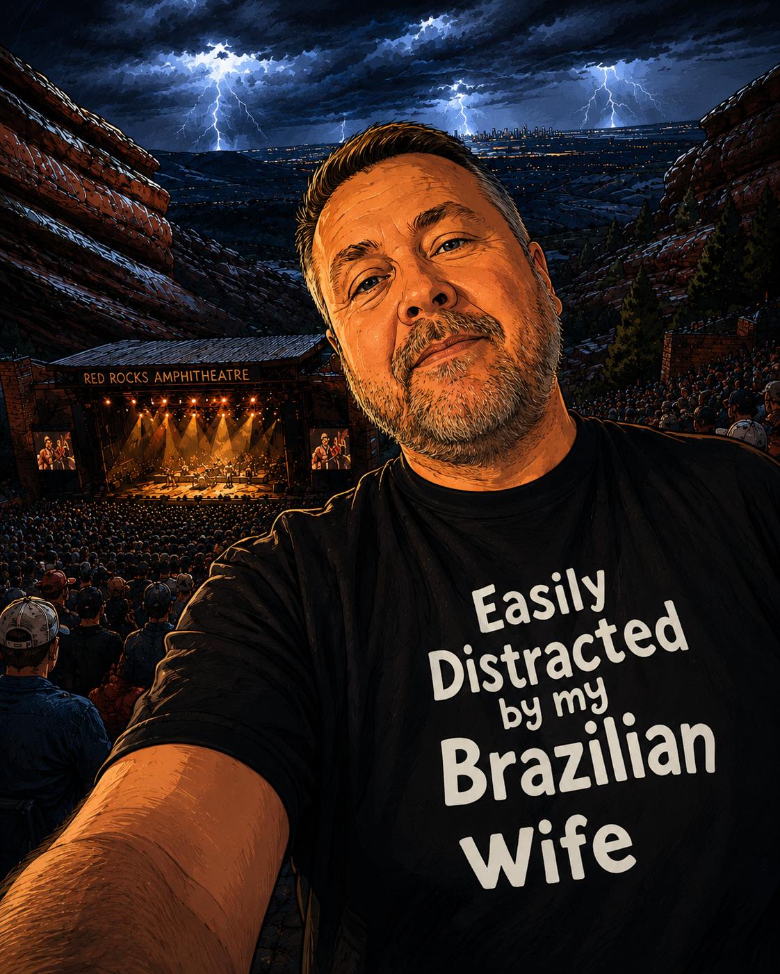 Man wearing a black t-shirt with text in front of a concert venue with lightning in the background