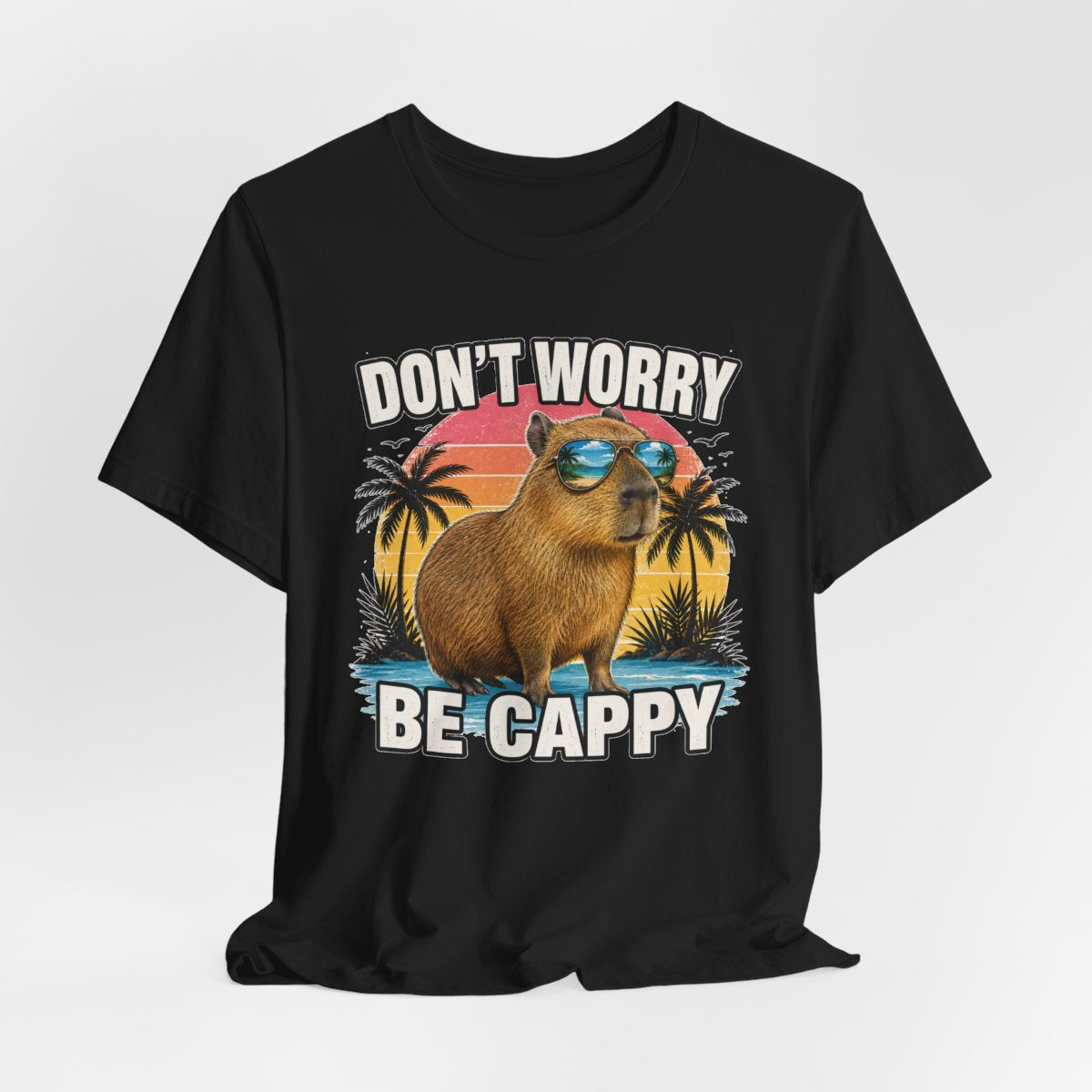 Don't Worry Be Cappy capybara t-shirt hanging mockup in Black